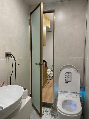 Thi công cửa nhôm slim Champagne Gold mở quay tại Hà Nội